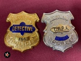 (2) Cleveland Police badges