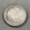 1878 Morgan Silver Dollar (7 tail feathers)