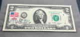 1976 First Day Issue $2.00 Bill, postmarked Reynoldsburg Oh with US Flag stamp, UNC