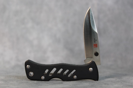 Al Mar,  black Zytel open scales,lock back 110/200 1st prod