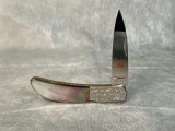 Al Mar 1002BP, Black lip pearl, Hawk W/ ETCHED BOLSTERS