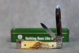 2005 Case XX Burnt Stag Gunstock w/John Deere Shield