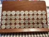 ROLL OF 40 SILVER WASHINGTON QUARTERS IN THE 1950S