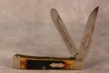 1999 Case XX Tang Stamp Collection 'Case Bros & Co.' Trapper