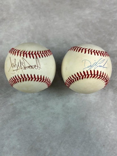 Jack McDowell and Dwight Gooden Signed American and National League Baseballs