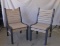 Two poly chairs, brown and black