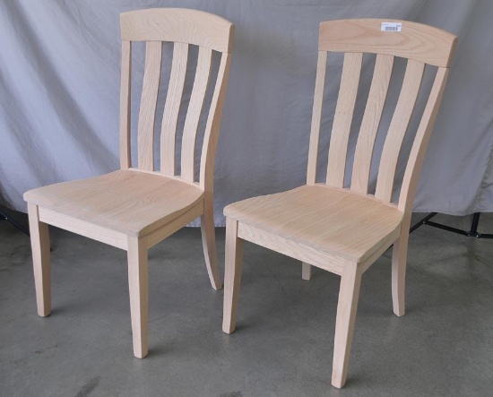 Two unfinished red oak chairs