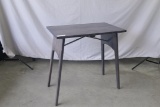 Folding fireside table