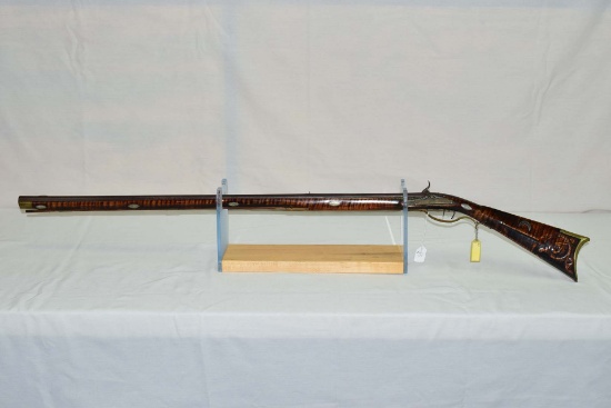 Joseph Mills  Full stock percussion muzzleloader  Cal Aprox. .42  39.5”/.9” oct. Barrel  Curly maple