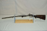 J P Sauer & Sohn  Bottom lever SxS  Cal 11.15x60R  Some Gold inlays  This gun was featured in the bo