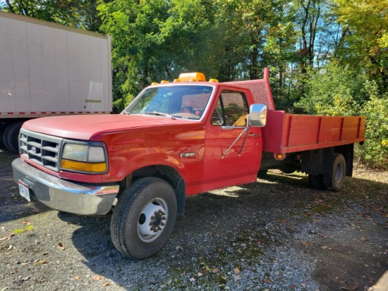 1993 Ford Super Duty dump bed truck showing 130,708 miles