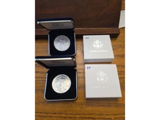 2-1986 1ST. YEAR BU SILVER EAGLES I BANK BOXES