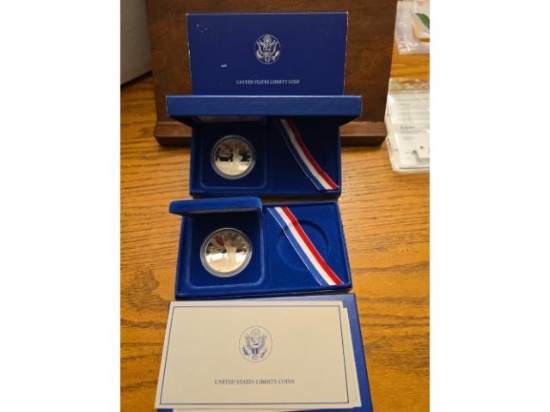 LOT OF 2-1986 STATUE OF LIBERTY SILVER DOLLARS IN HOLDERS PF