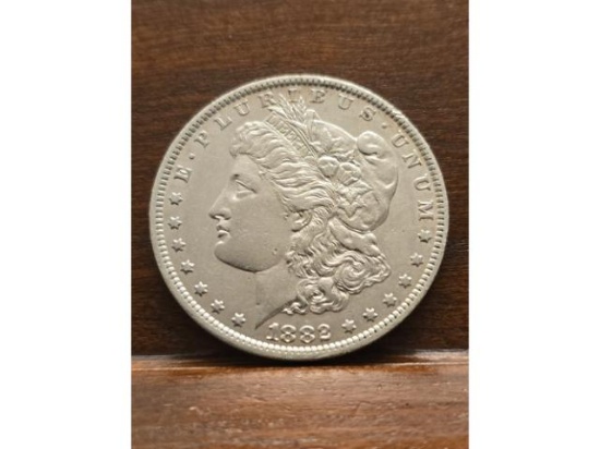 1882O MORGAN DOLLAR AU