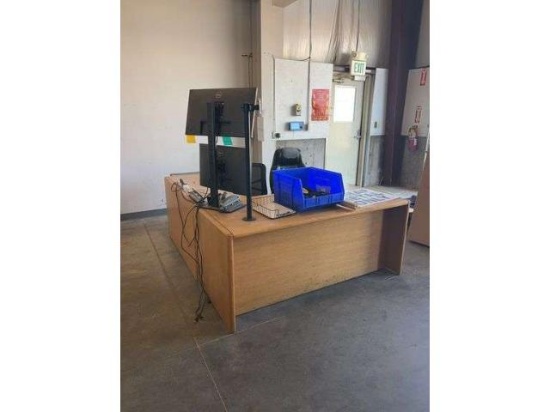 Office desk, chairs, monitors, file cabinet, misc
