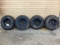 (4) 25X10X12 KENDA TIRES ON BLACK STEEL D-WINDOW WHEELS