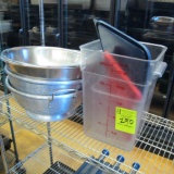 contents of shelf- collandars, stainless bowls, plastic containers
