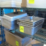 contents of shelf- stainless pans, lids, sheet pans