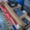 pallet of cleaning implements: broom kits, Malish side broom for sweeper