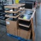 pallet of assorted product risers