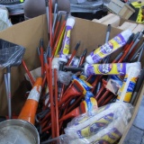 crate of new cleaning implements