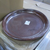 pallet of new clay saucers