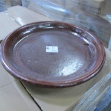 pallet of new clay saucers