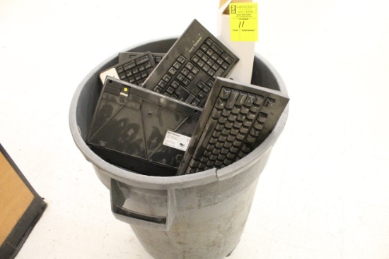 Trash Can W/ Assorted Keyboards