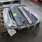 pallet of steel parts, mostly shelf supports for 2' d warehouse racking