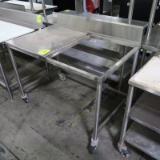 stainless table w/ space for poly cutting board, on casters