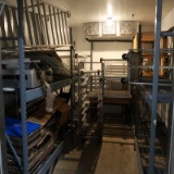 contents of room: warehouse shelving, deli slicers, sheet pans,