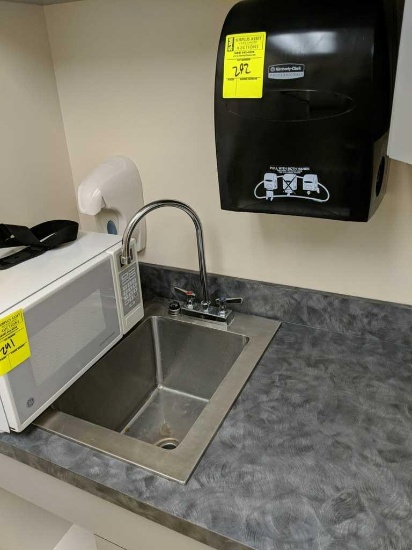 Stainless sink Basin w/ soap and paper towel