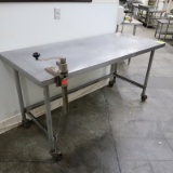 stainless table w/ can opener, on casters