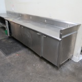 stainless table w/ back & side splash & cabinets under