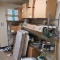 contents of room: 3) shelving units, scale/scanner, frying pans,