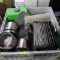 container of stainless soup pans, stainless lids, eye wash station,