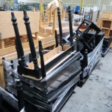 pallets of decorative black wooden tables