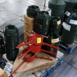 pallet of Christmas tree stands