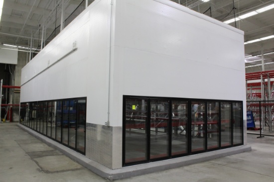 43 Door Cooler. Has pallet wide door, 14 sections of racking, and 4 Bohn 2 fan coils.  50'x20'x20'