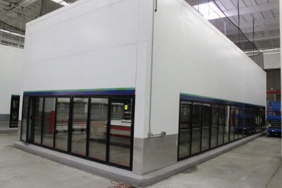 43 Door Cooler. Has pallet wide door, 14 sections of racking, and 4 Bohn 2 fan coils.  50'x20'x20'