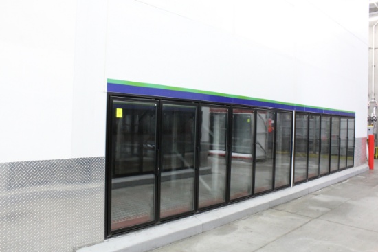 12 Door Freezer. Comes with pallet wide door, 8 sections pallet rack, 2 Bohn 4 fan coils.  36x20x20'