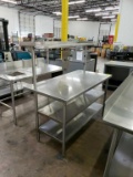 Stainless steel table with over shelf