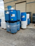 7 pallets of plastic barrels