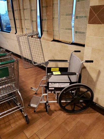 Wheel chair with basket