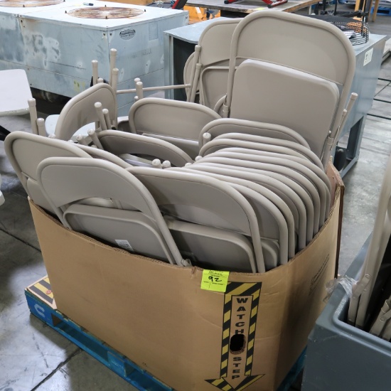 crate full of folding chairs