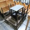 pallet of wooden tables w/ galvanized tops