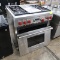 Wolf 4- burner range w/ center charbroiller & oven, oven door is removed