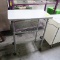 wire shelving table, on casters, solid top