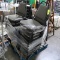 pallet of cushioned stackable chairs