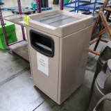 waste receptacle w/ tray collection on top